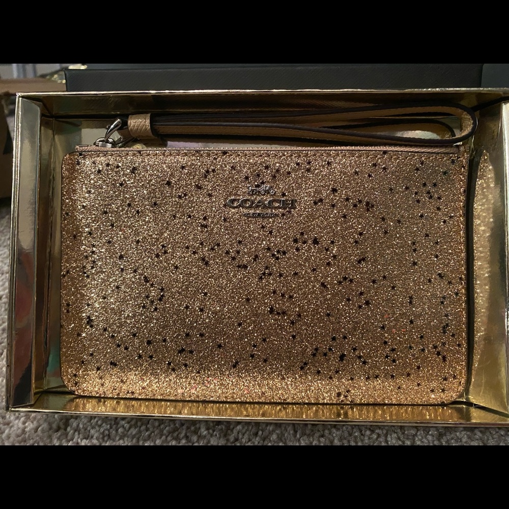 Brand New! Coach wristlet silver/gold star glitter